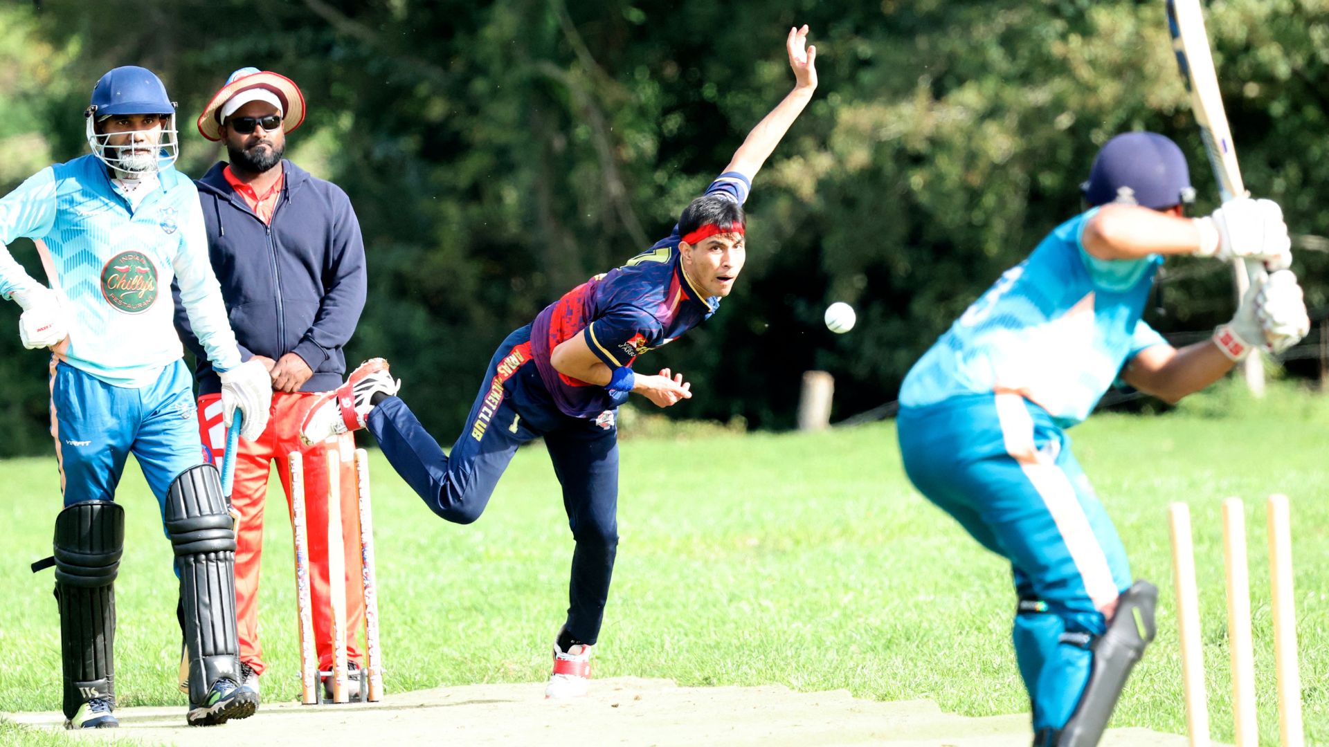 An Arras player bowls the ball at the Liettres Challenge, a tournament launched in 2015 to celebrate the hamlet's unlikely place in cricket history. /Francois Lo Presti/AFP
