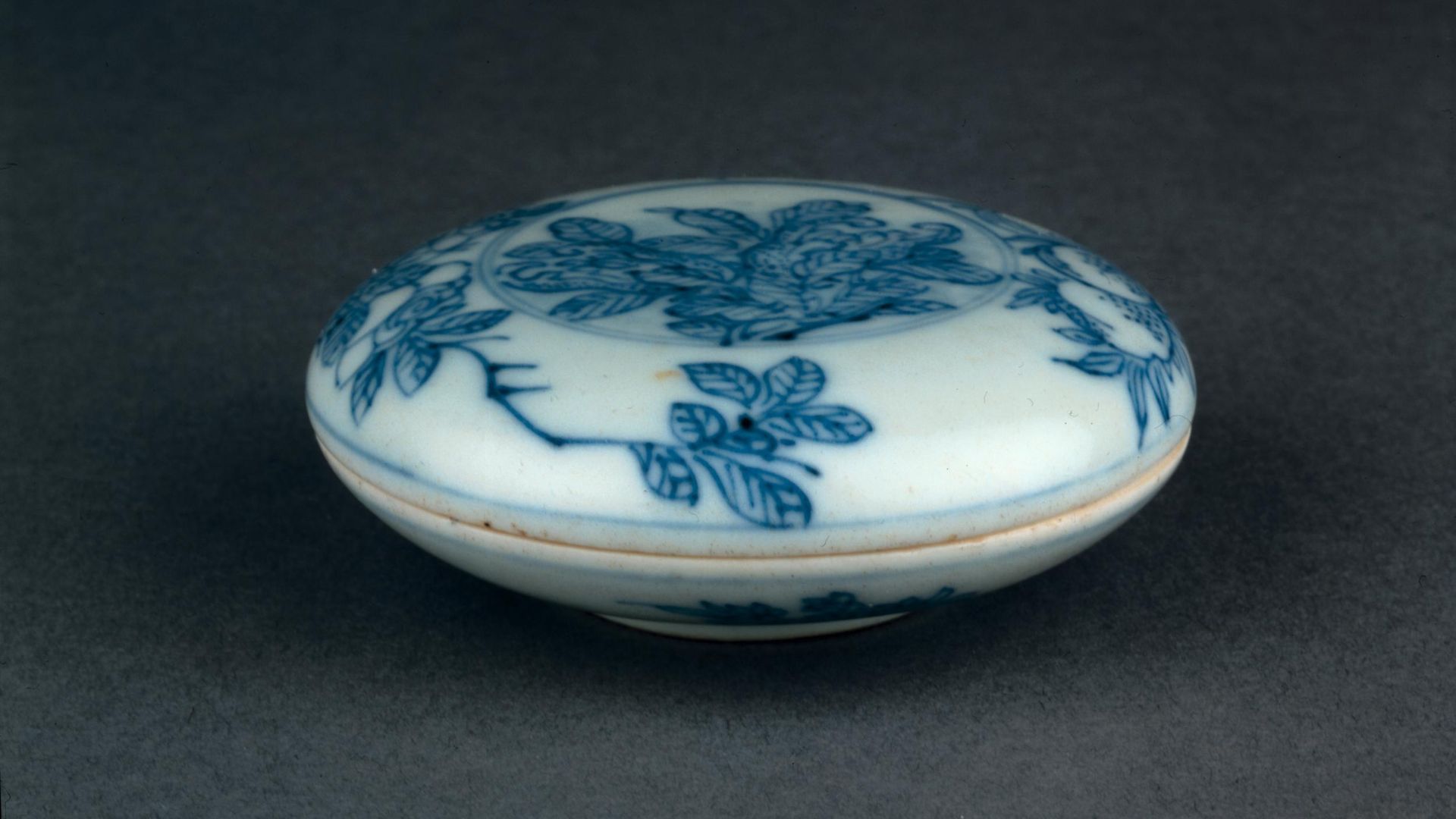 The box, decorated with fruits and flowers, is part of a collection that also houses coveted Ming vases. /British Museum