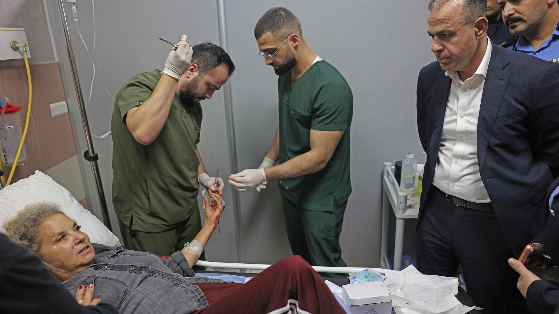 Washington Post photojournalist Heidi Levine recovers in hospital after being attacked and beaten by masked Israeli settlers whilst documenting Palestinians harvesting olives. /CFP