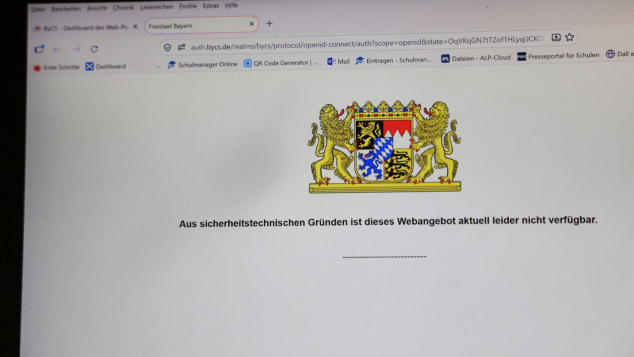 A teacher's computer screen shows the Bavarian state logo and a message stating, 'This website is temporarily inaccessible for security reasons,' in Bavaria, Germany. /CFP