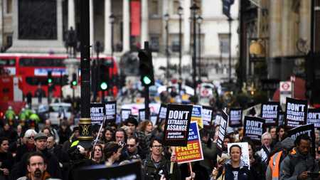 Hundreds attend Julian Assange extradition march in London - CGTN